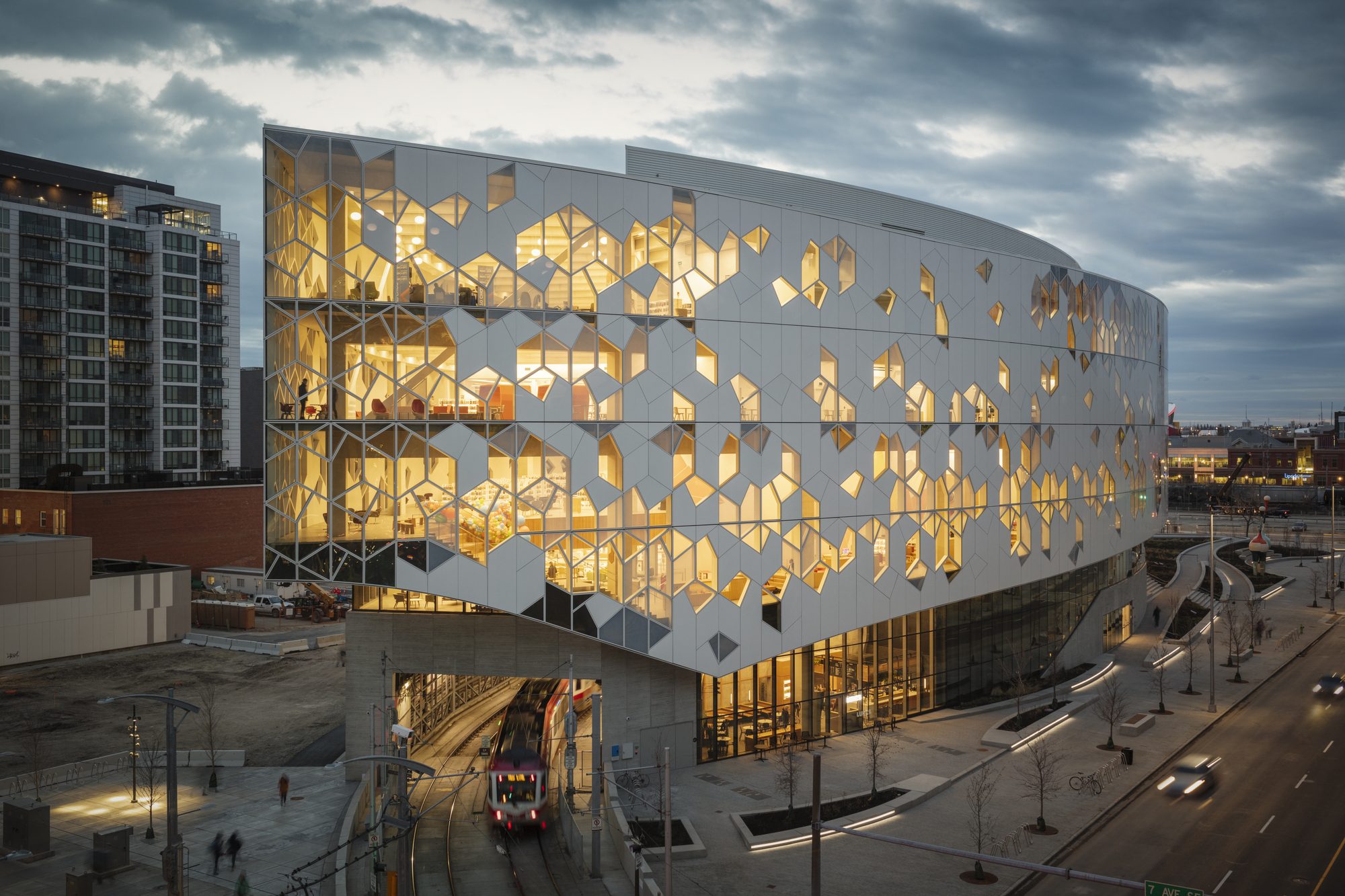 Alpolic Canada — Calgary Central Library crystalline ACM and glass façade glowing at dusk, distributed by Exterior Technologies Group