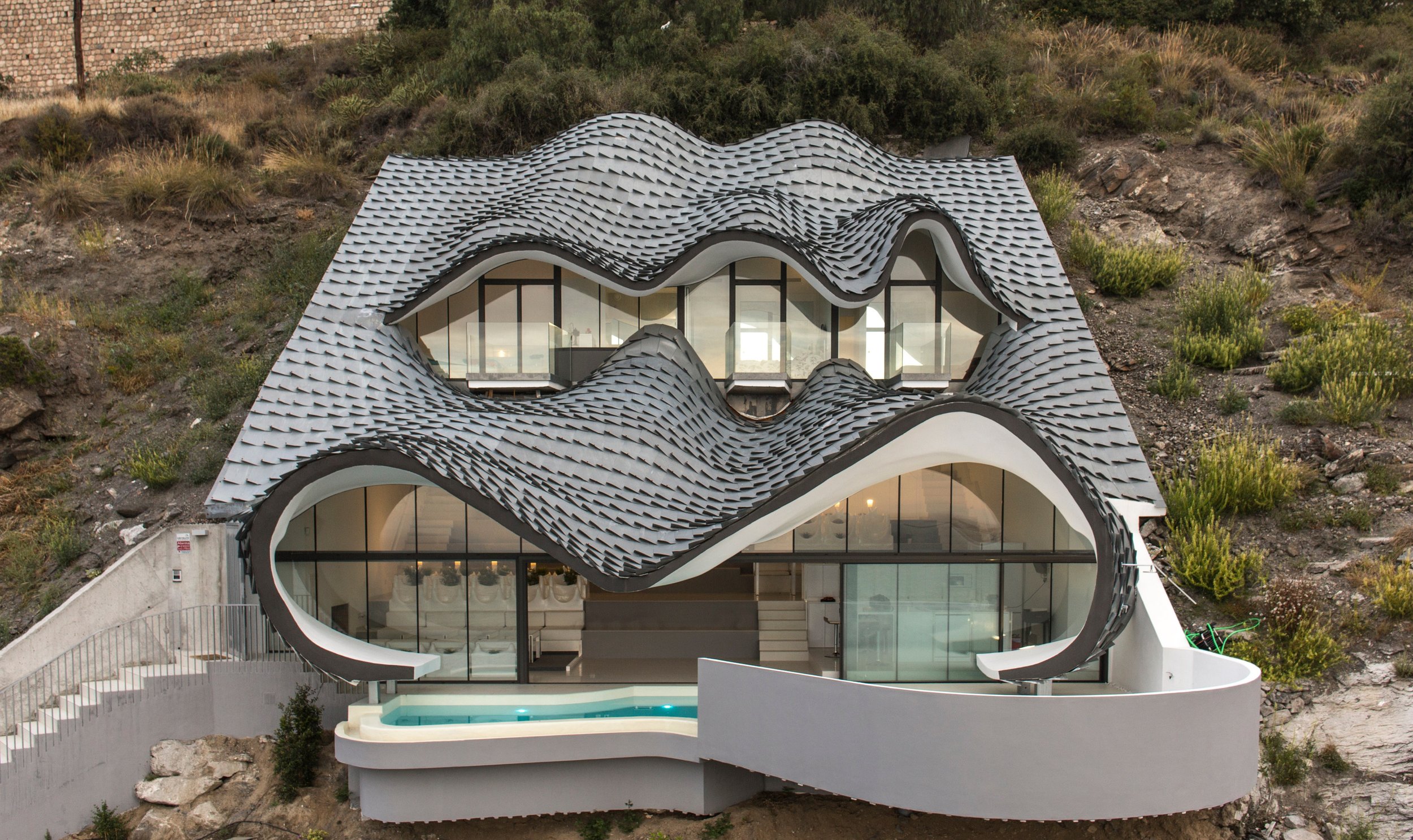 elZinc Canada — Cliff House Granada sculpted zinc shingle roof, supplied by Exterior Technologies Group