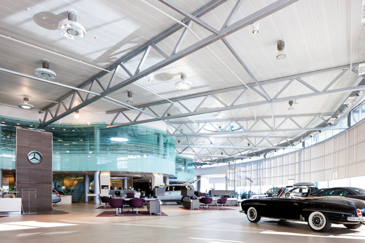 EPIC Metals Canada — structural deck ceiling above Mercedes-Benz dealership showroom with exposed steel truss, by Exterior Technologies Group