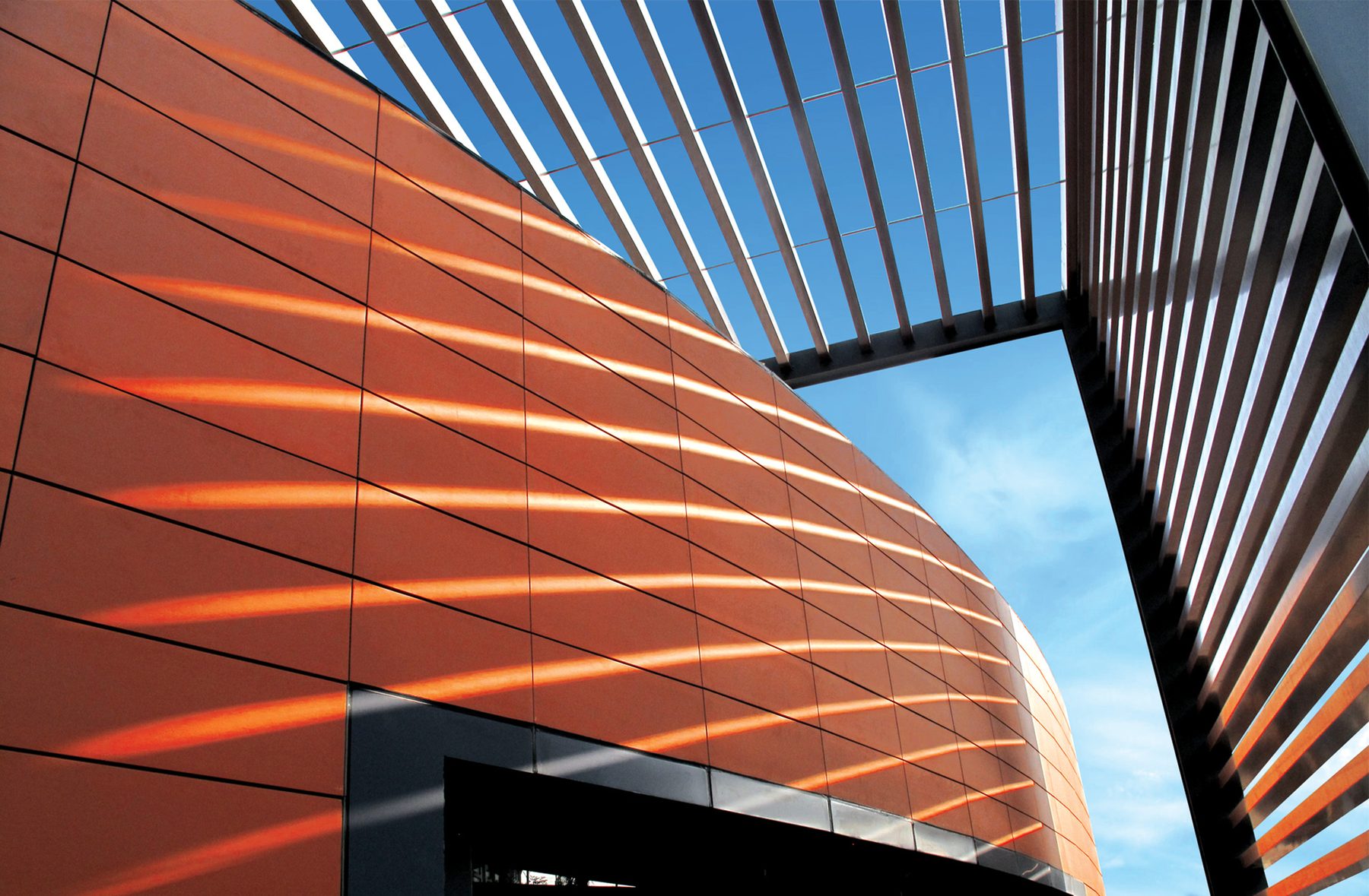 Terracotta Favemanc Canada — curved sculptural ceramic ventilated façade detail, supplied by Exterior Technologies Group
