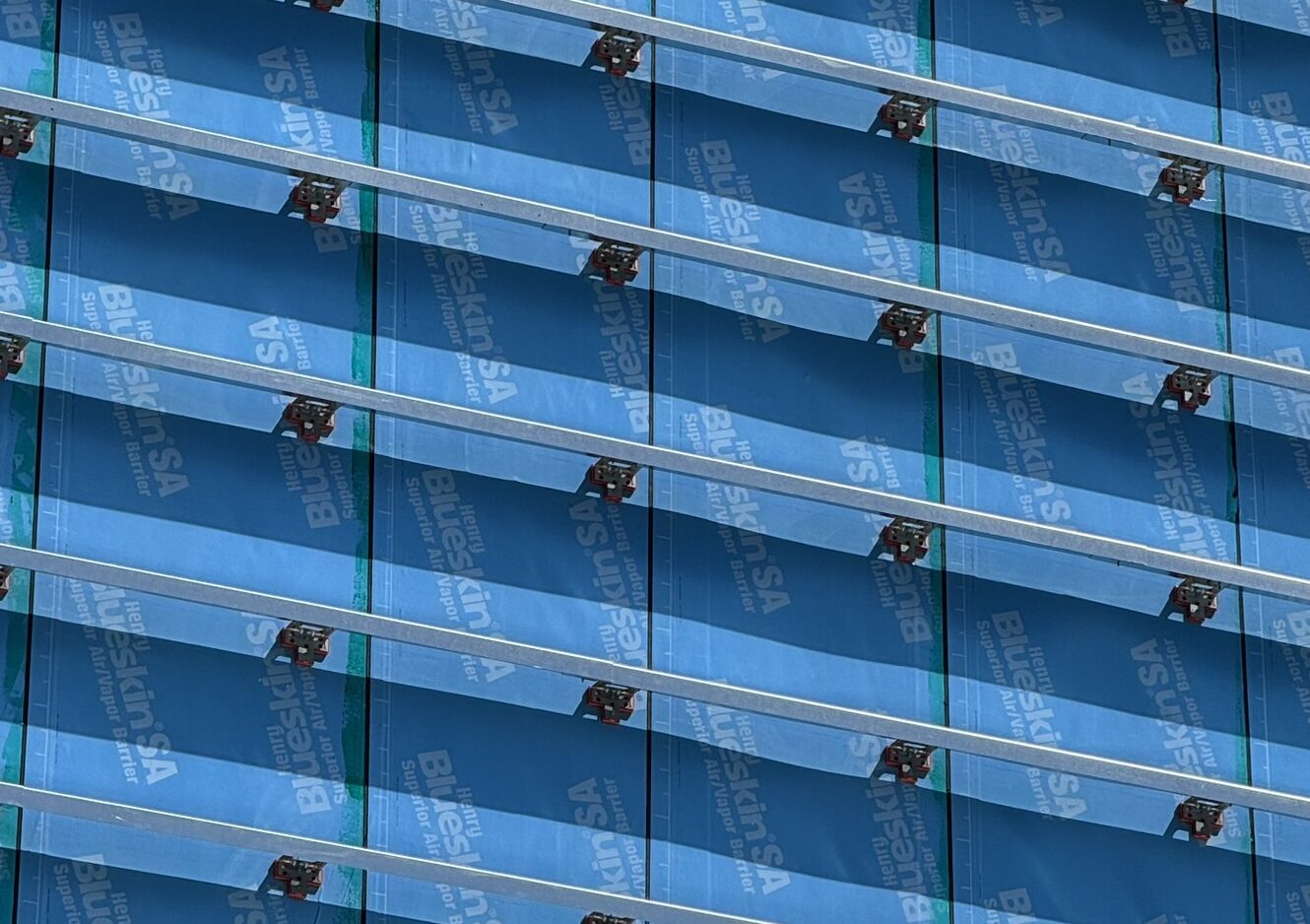TAC Thermal Spacer Canada — clip detail with horizontal aluminum subgirts standing off the Blueskin SA barrier, supplied by Exterior Technologies Group